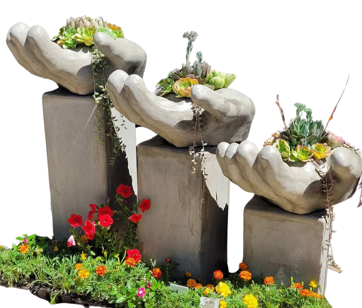 Hand planter set on pedestal
