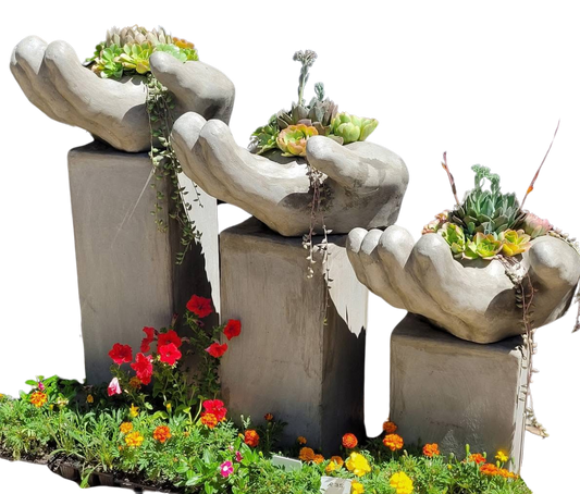 Hand planter set on pedestal